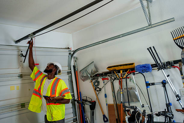Professional Garage Door technician working in Devine, TX